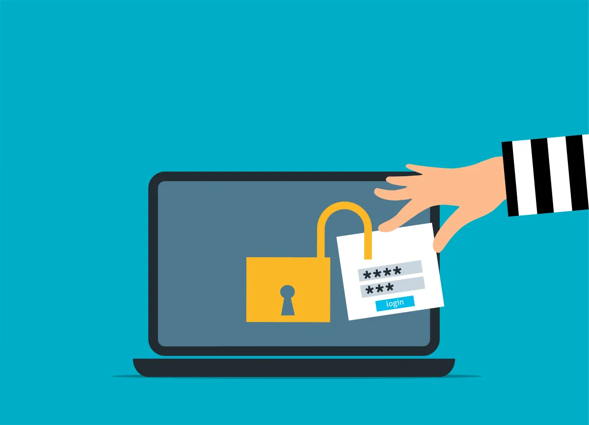 A hand reaches for a password note next to an unlocked padlock on a laptop screen, symbolizing security risks.