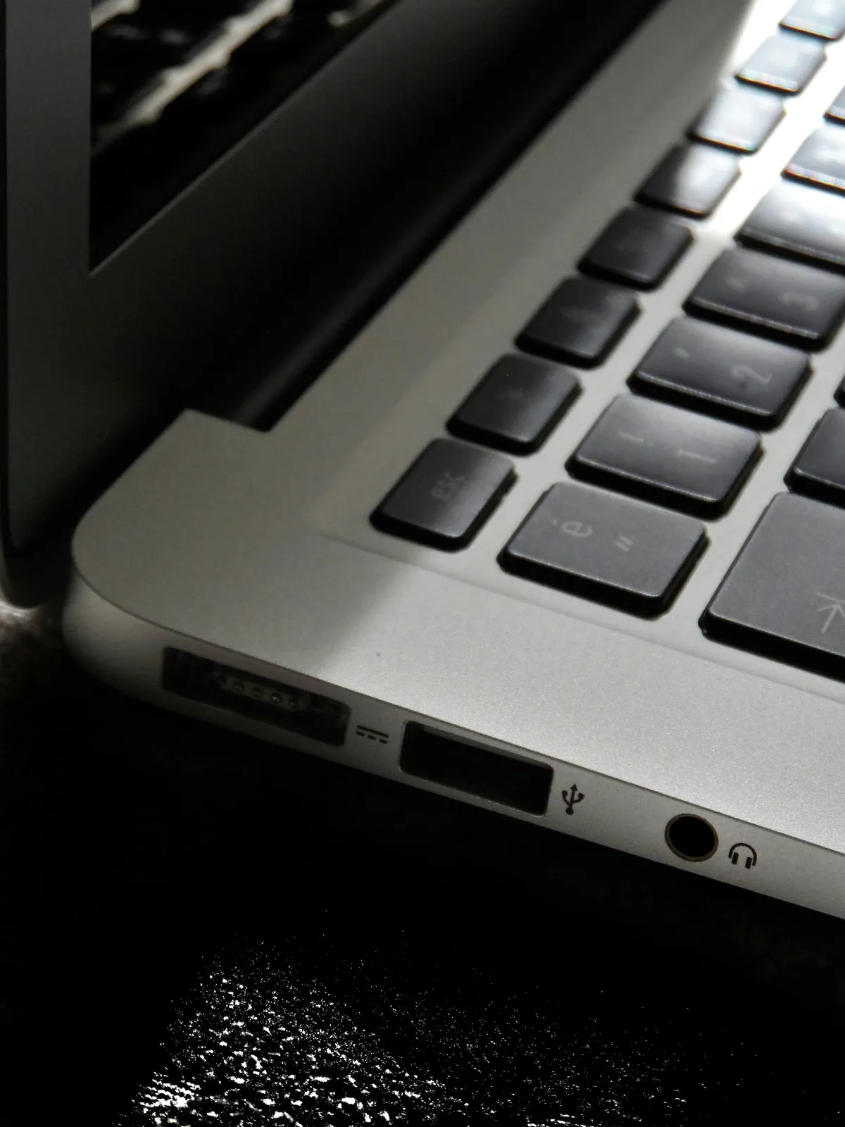 Laptop keyboard highlighting SaaS access audit risks from former employee accounts