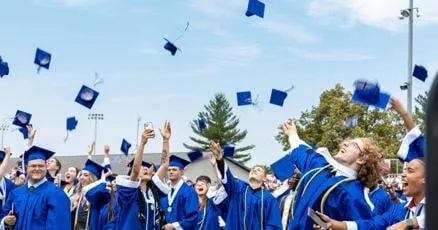 person about to touch the calm water