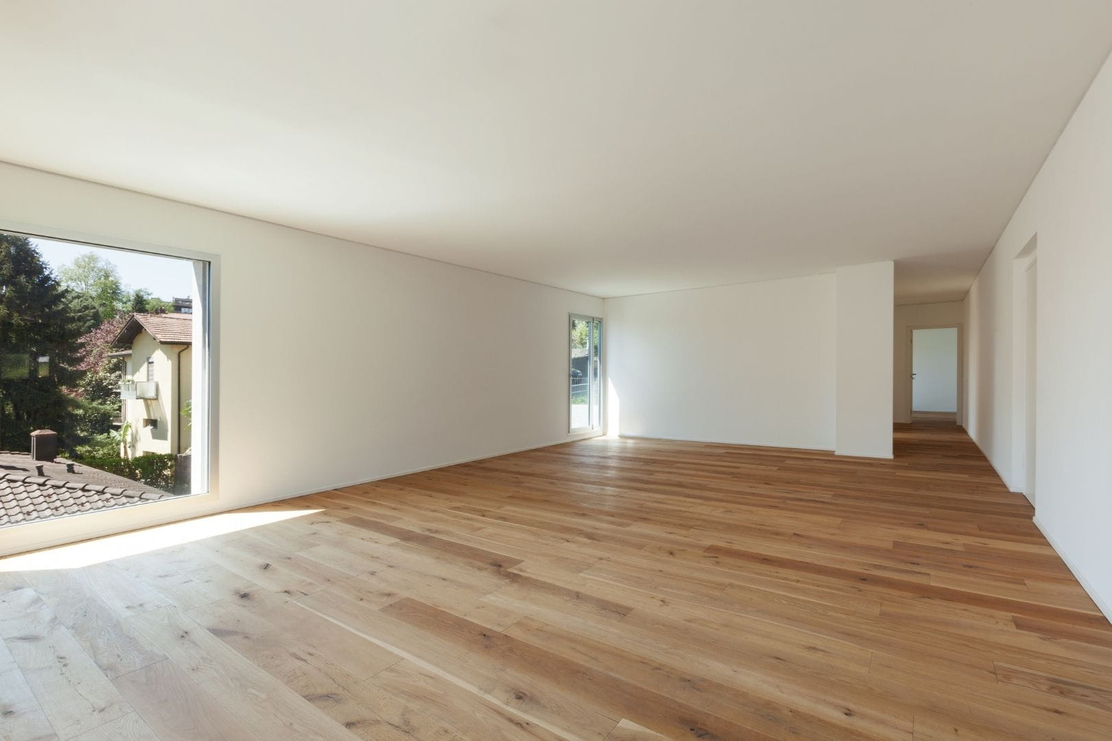 Application d'une finition huilée sur un parquet ancien restauré à Dreux