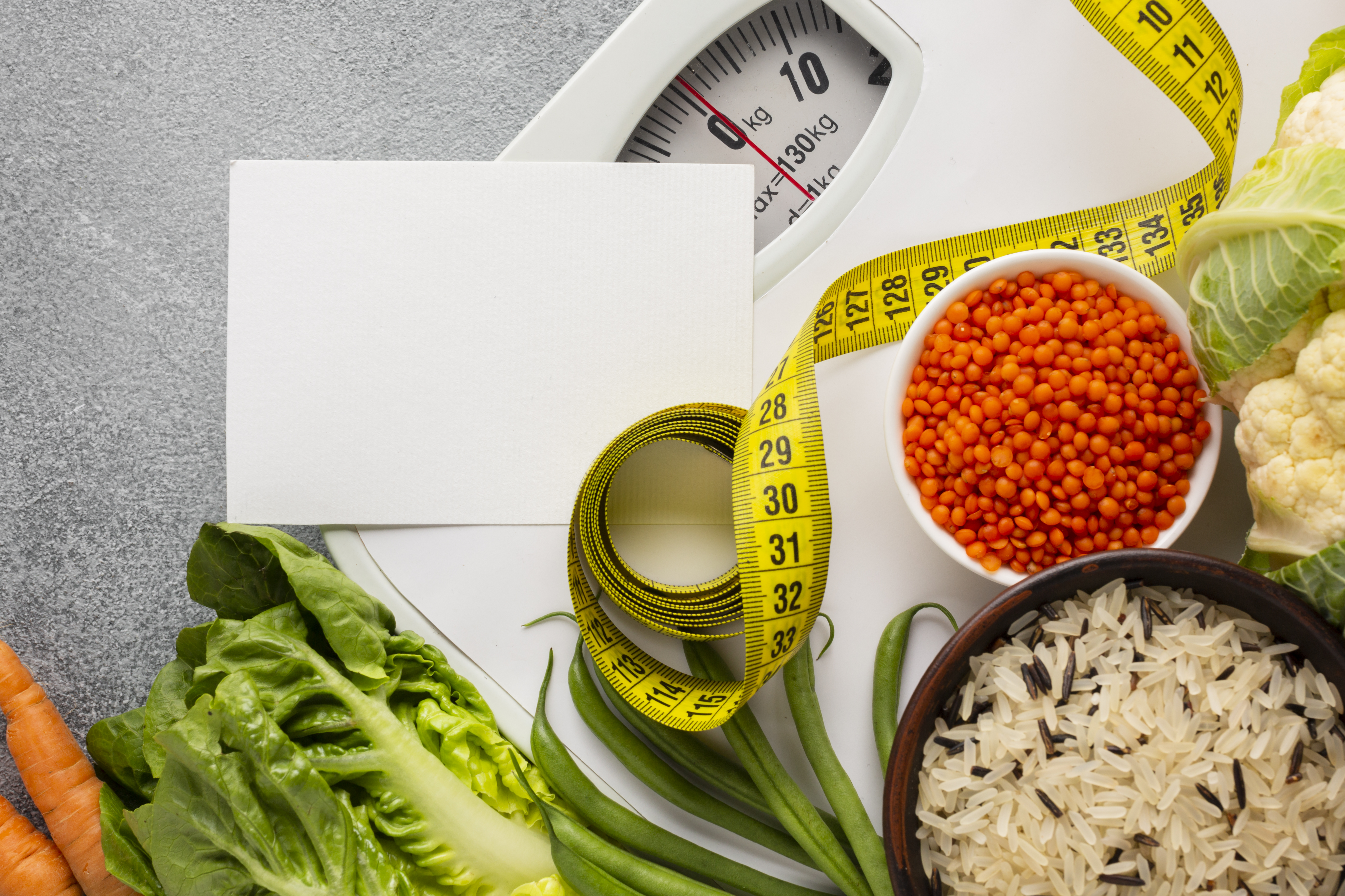 Groceries on scale with mock-up note