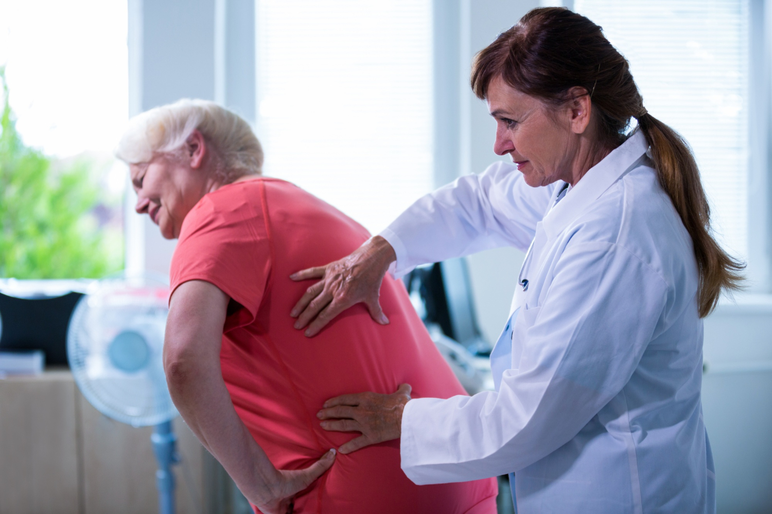 Female doctor examining a patient