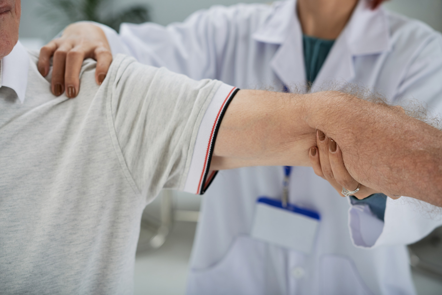 Man having his arm treatment due to pain