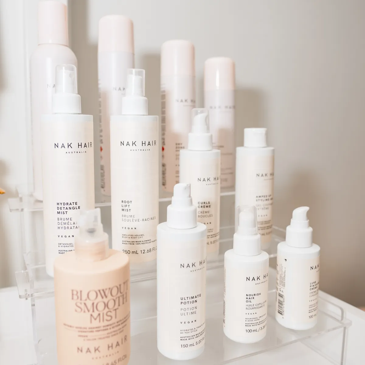 Full-body portrait of Brooke showcasing long, seamless luxury hair extensions designed for fullness and confidence.