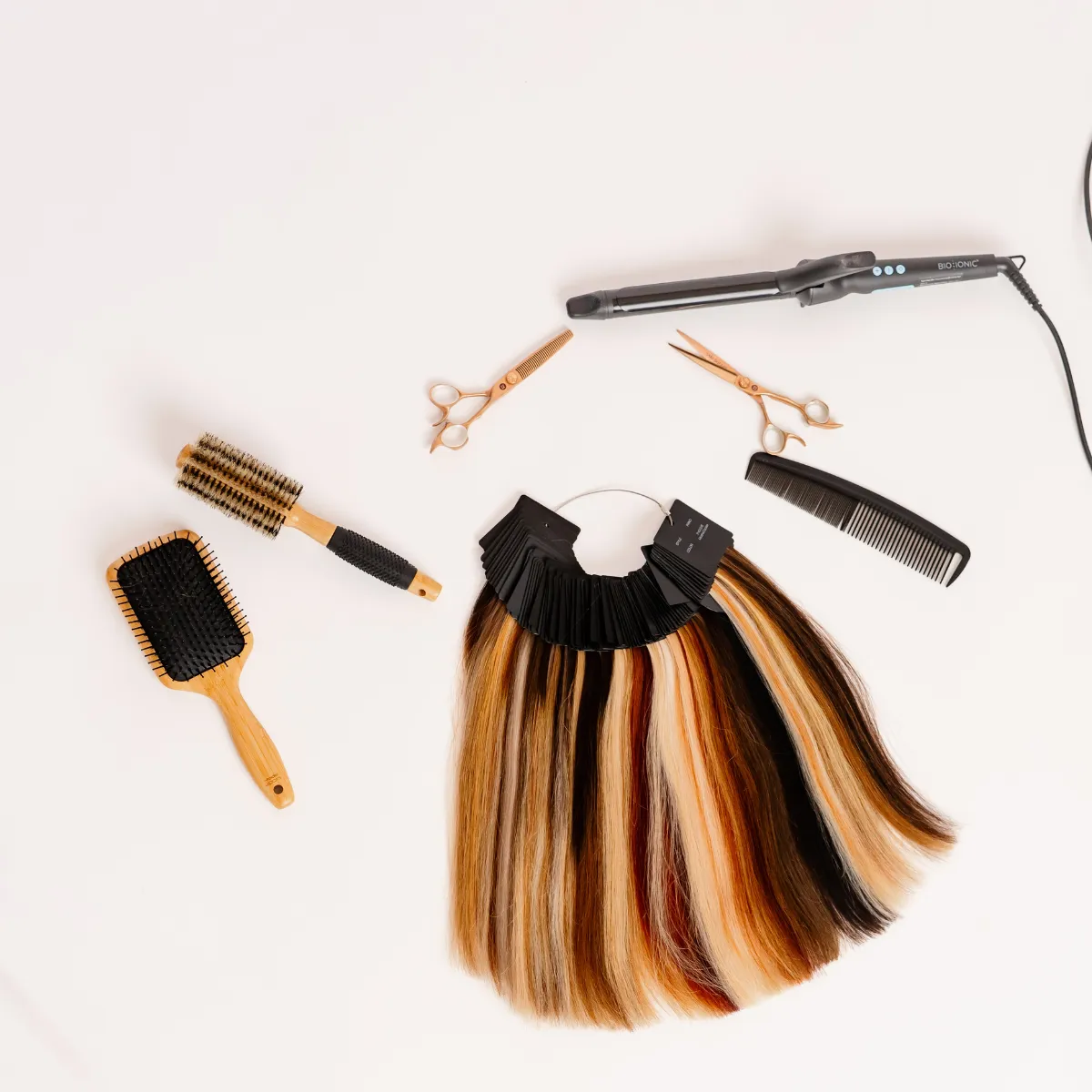 Luxury hair extension tools and premium extensions displayed at a Lancaster, PA hair extension studio