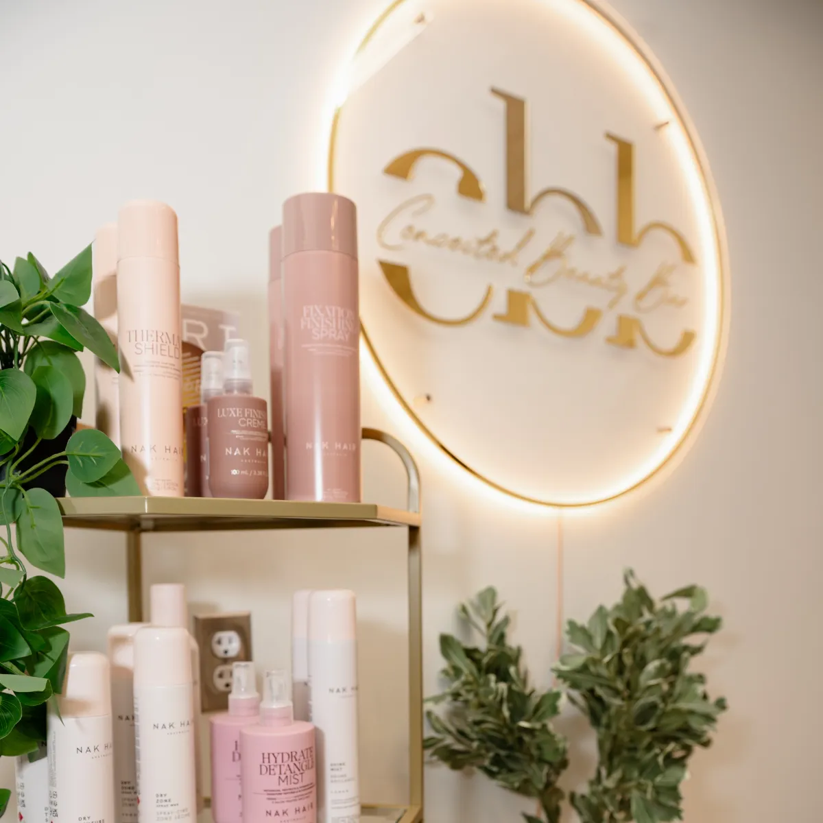 Interior of Conceited Beauty Bar featuring luxury hair and skincare products in a calm, elevated studio environment