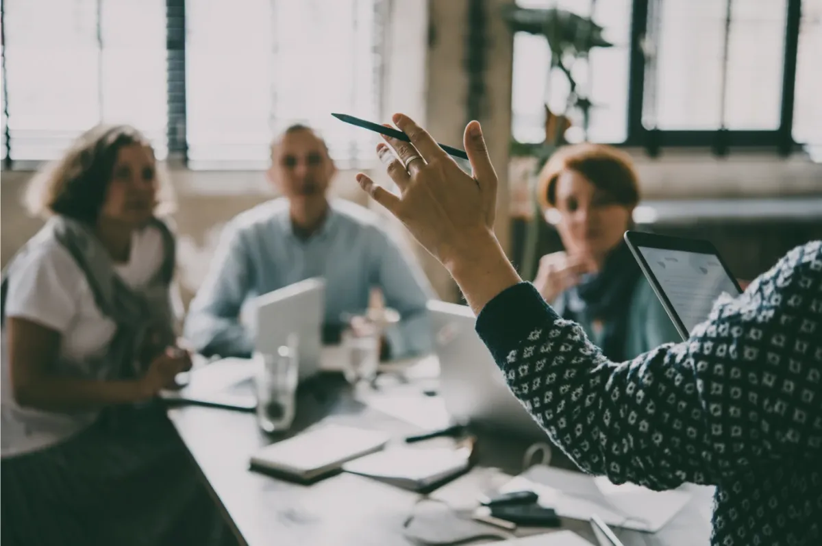 a row of houses with a blue sky in the background