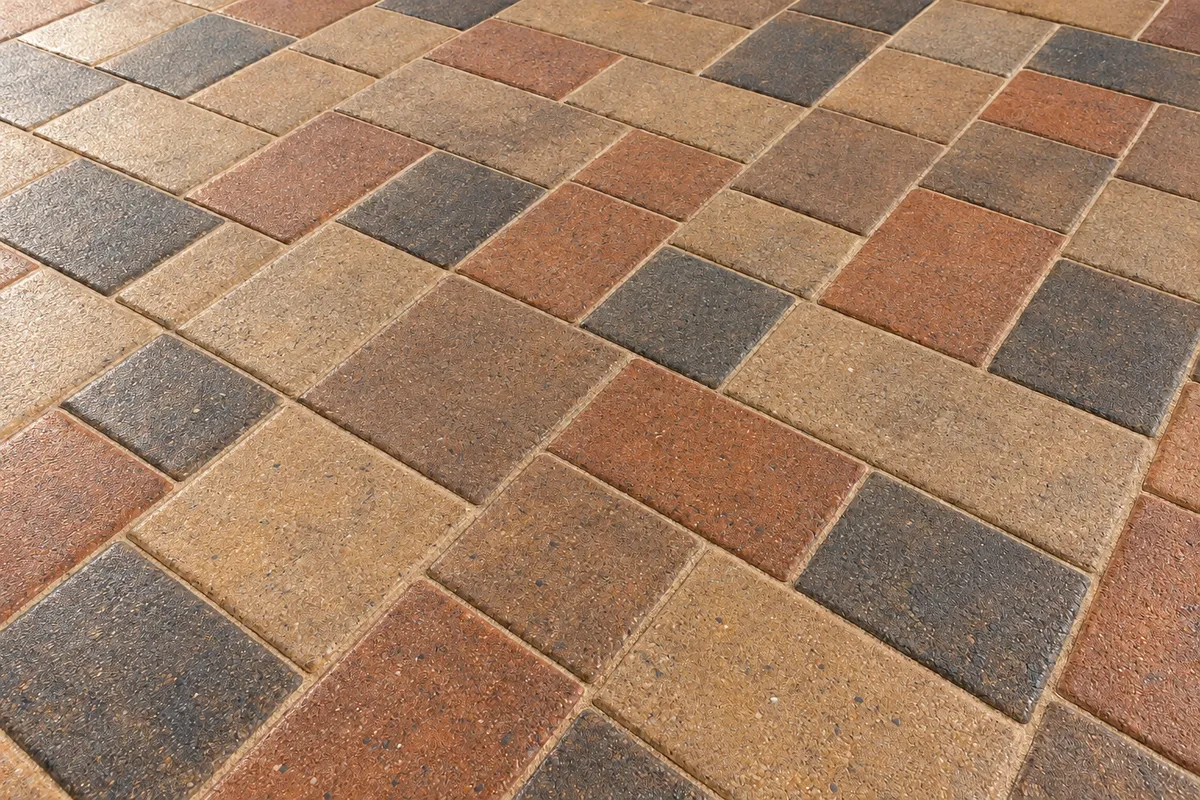 Semi-gloss wet look paver finish highlighting enriched earth pigments and joint sand