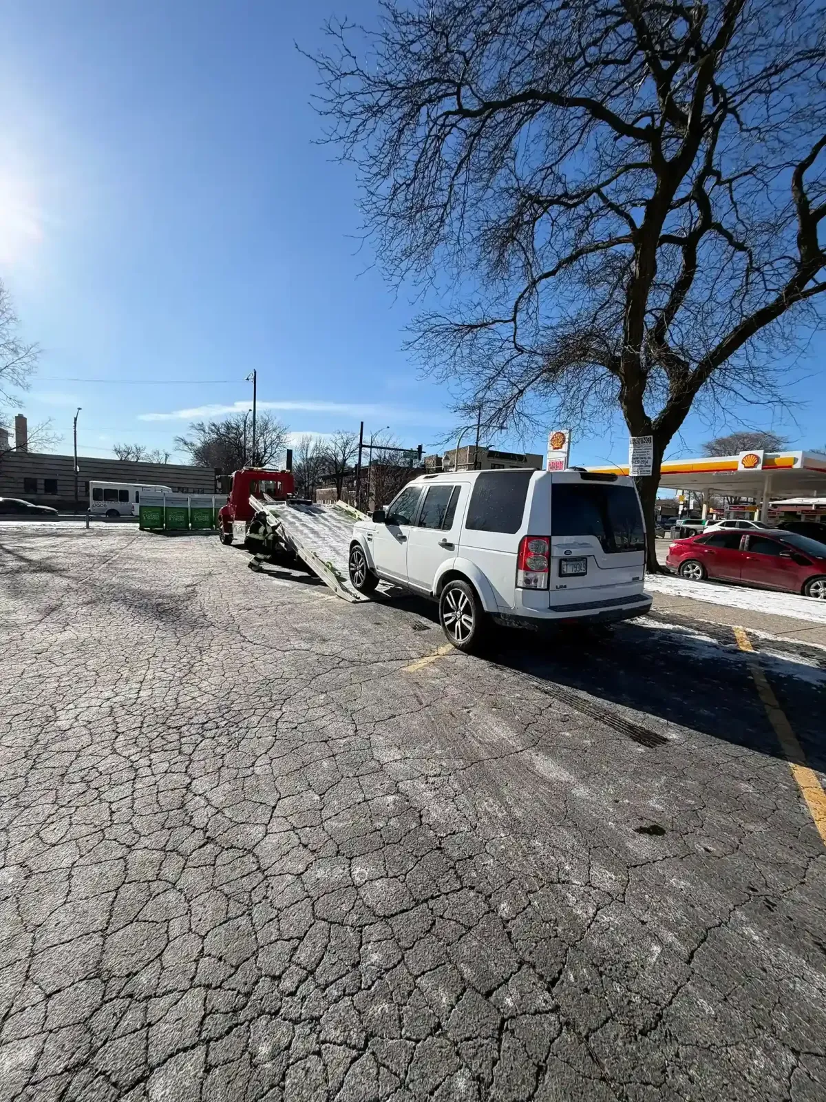 Flatbed recovery of an accident-damaged vehicle