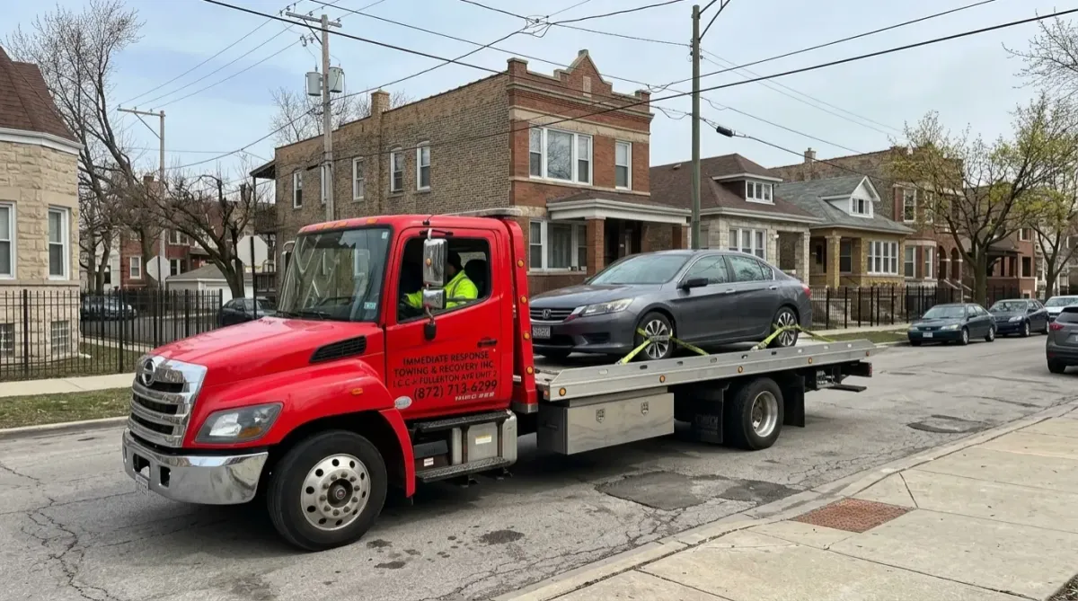 Tow truck towing Light duty car in Humboldt Park