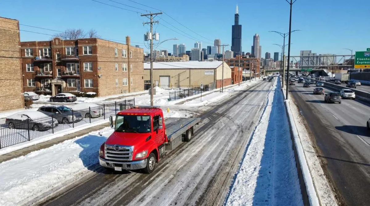 Towing service on a West Side Chicago street near the Eisenhower Expressway