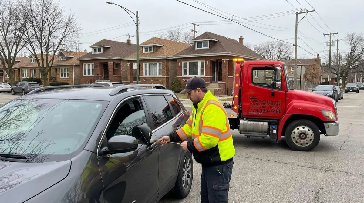 Roadside technician unlocking a car door without damage in Dunning