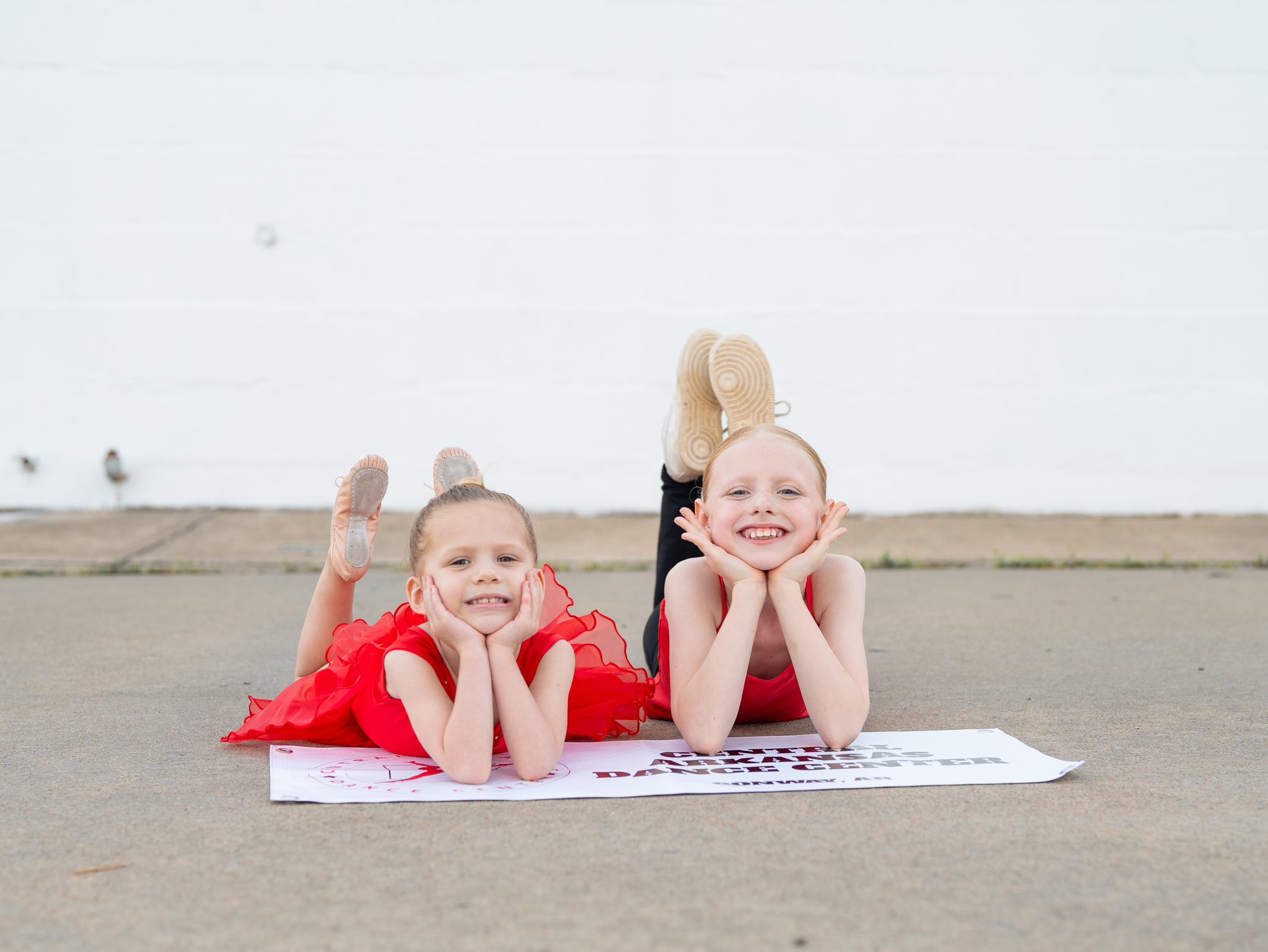 Young dancers practicing ballet at the barre