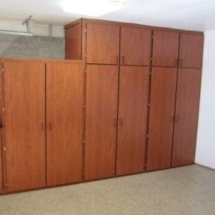 wall of wooden garage cabinets