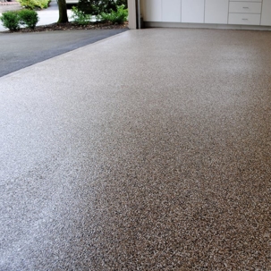 garage floor coated with an epoxy flake system
