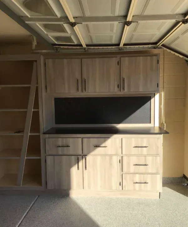 Garage cabinets with workbench and drawers for tools and organized garage storage