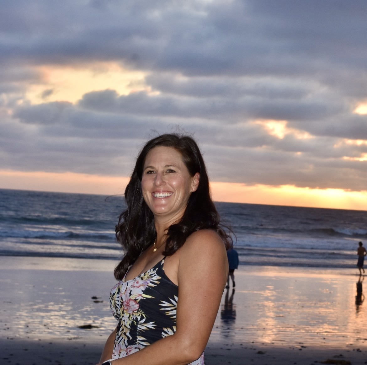 Bedroom with two windows and a cozy bed.