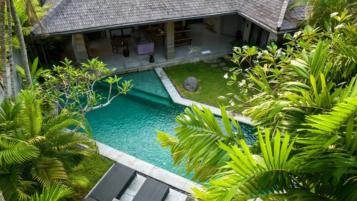 Aerial view of terraced rice fields and forest in Bali