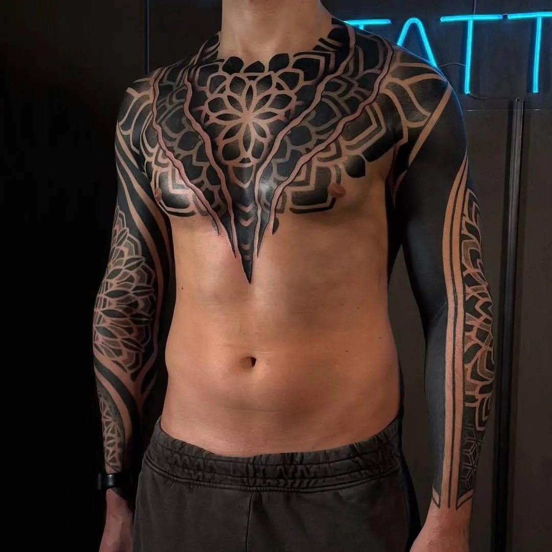 person in blue denim shorts and white nike sneakers standing on gray concrete floor