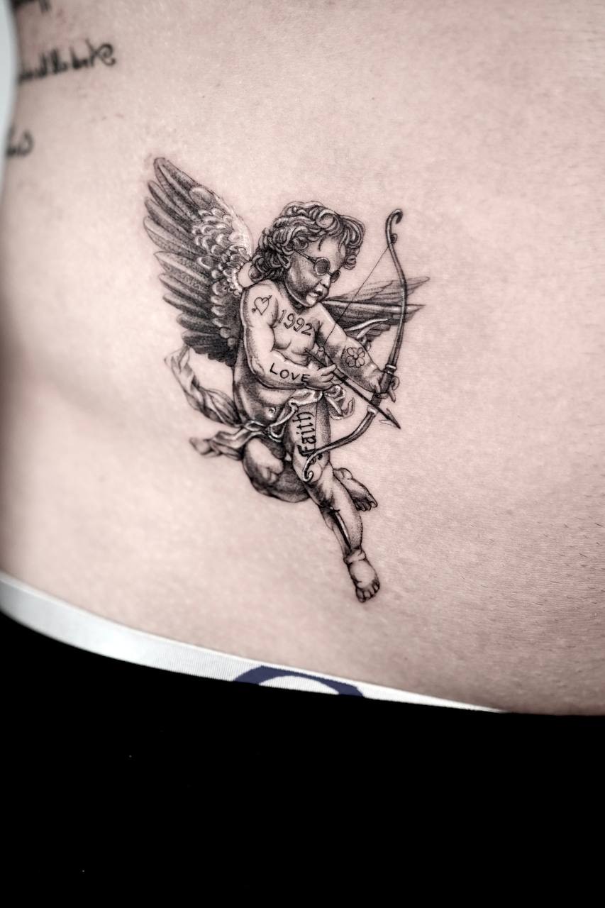 person with tattoo on right arm