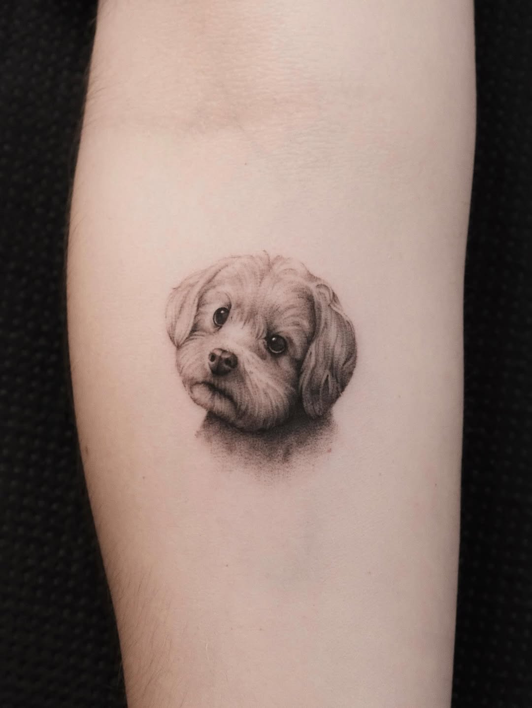 person in blue denim shorts and white nike sneakers standing on gray concrete floor