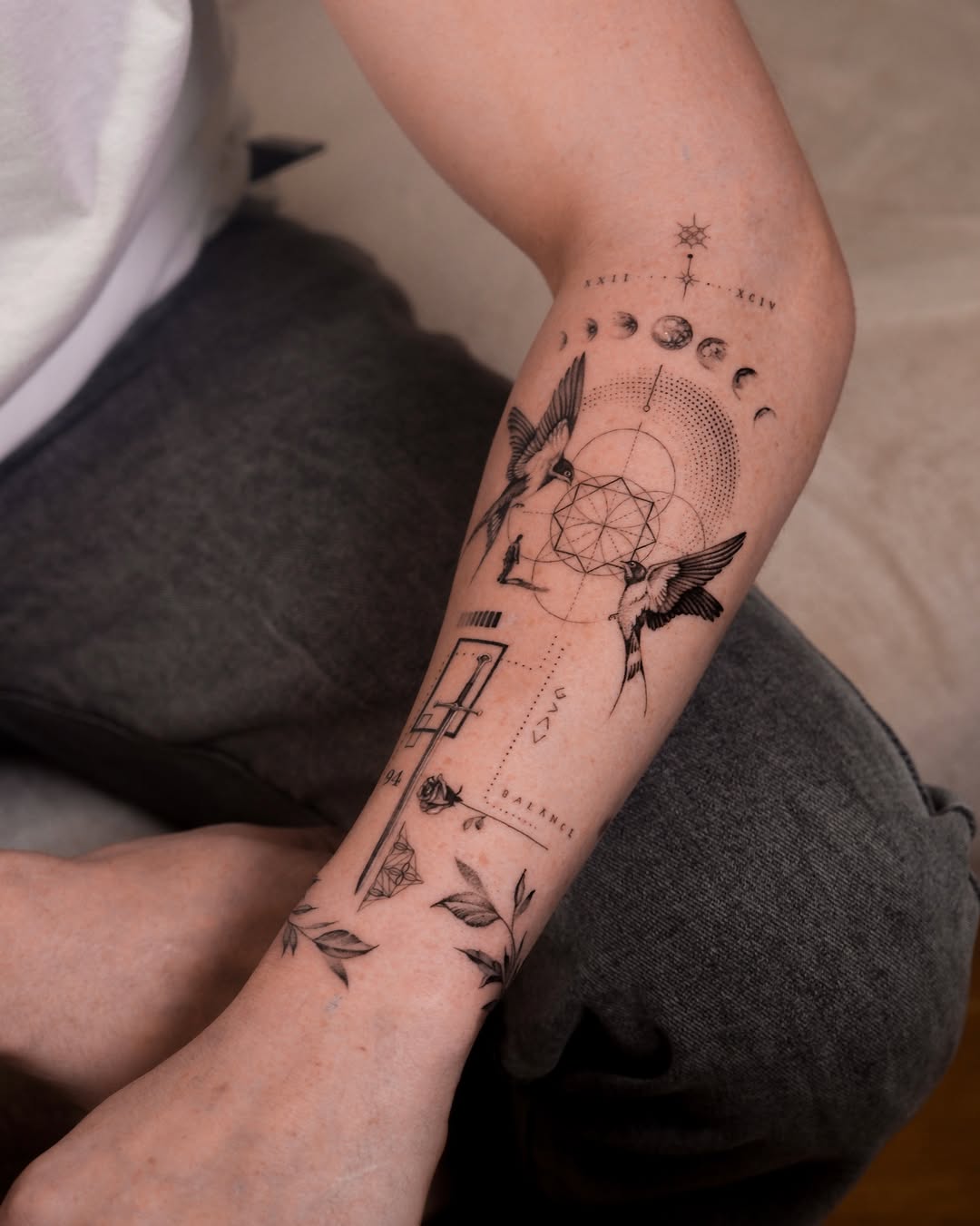 person in blue denim shorts and white nike sneakers standing on gray concrete floor