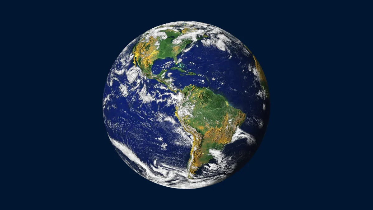 dark blue background with a globe n the middle