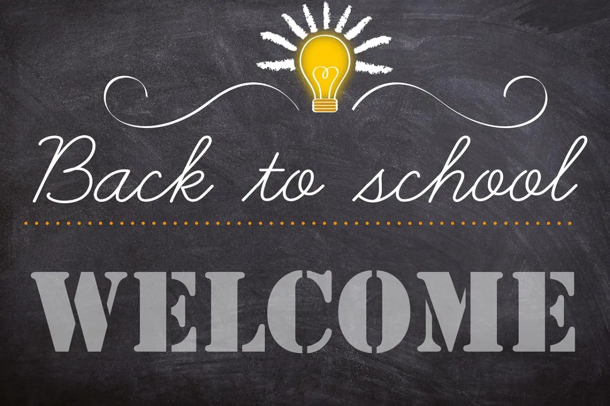 a blackboard with a lightbulb drawn on it, and the text, "Back to School Welcome"