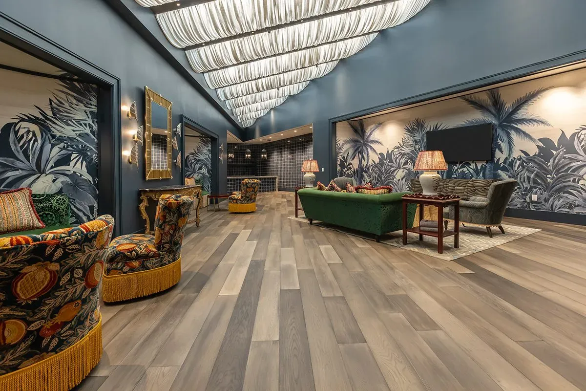 This photo features a lounge with a beautiful white oak flooring