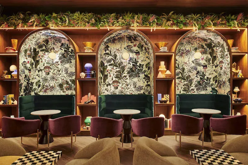 This photo features a hotel lobby that uses texas post oak