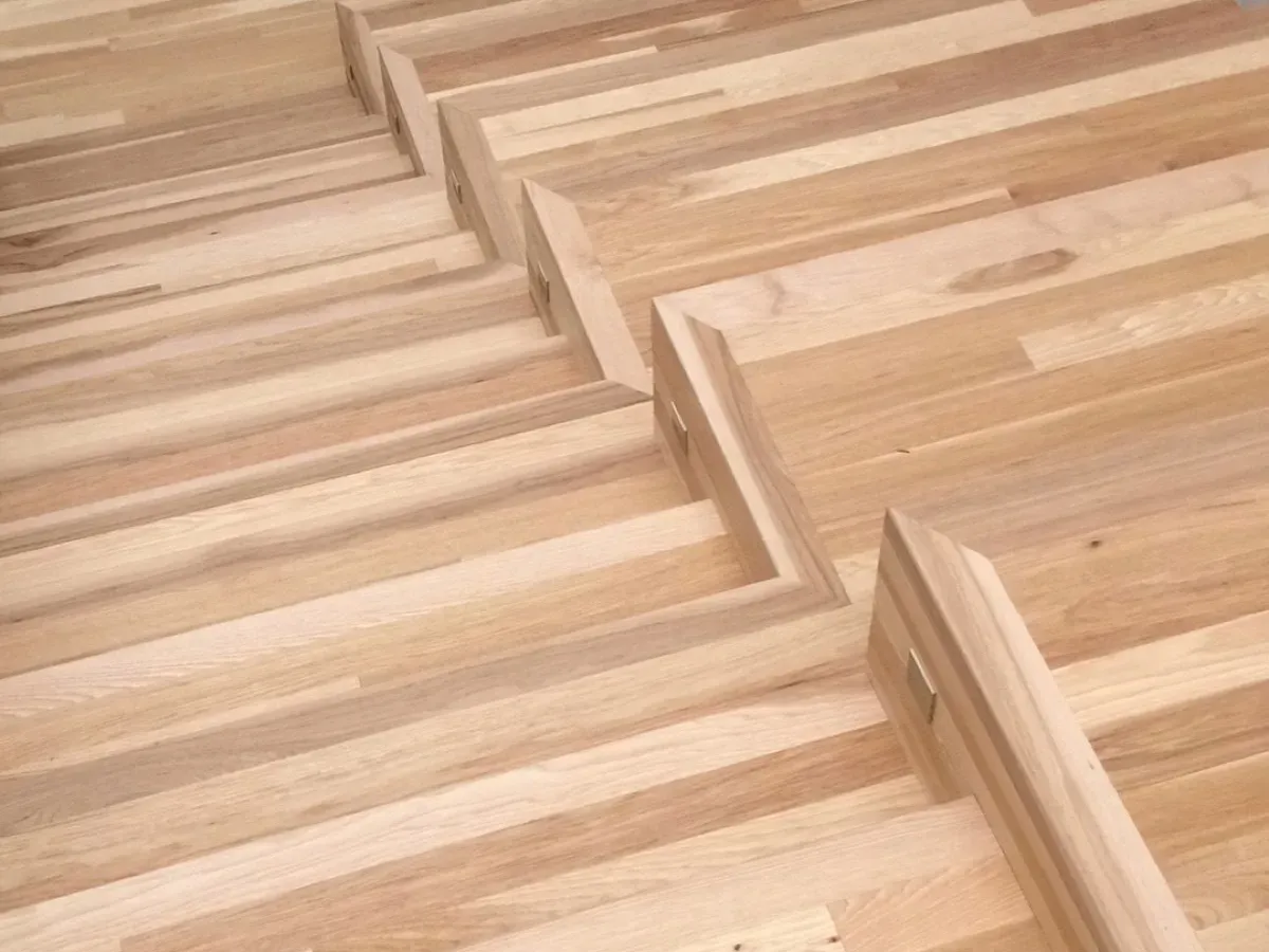 This photo features pecan wood flooring on stairs