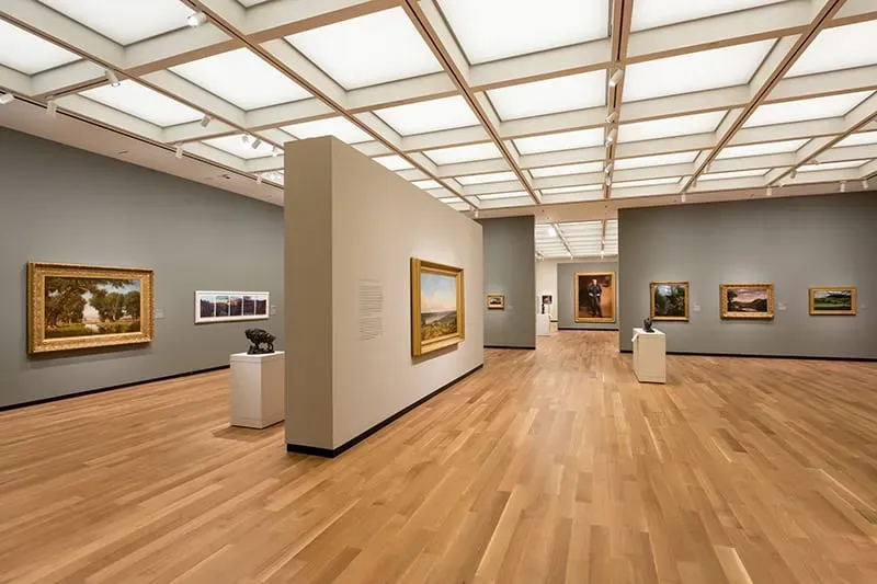 This photo features a museum with hardwood flooring