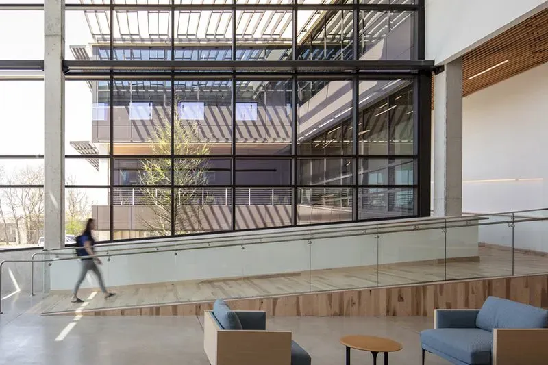 This photo shows a ramp at a corporate office that uses Hickory/Pecan wood