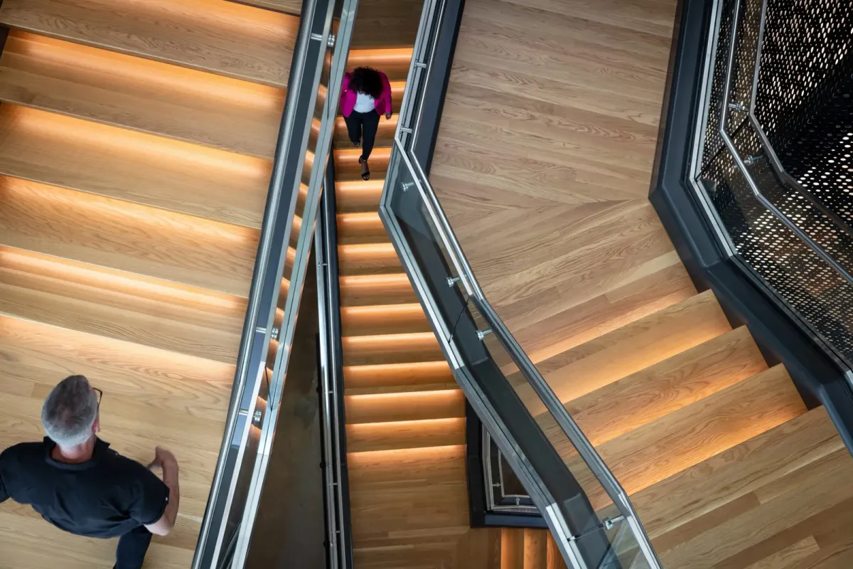 This photo features a stunning bespoke staircase installation for a corporate office.
