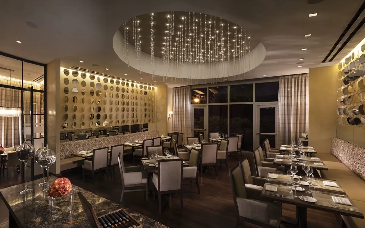 This photo showcases a restaurant that uses custom wood floors