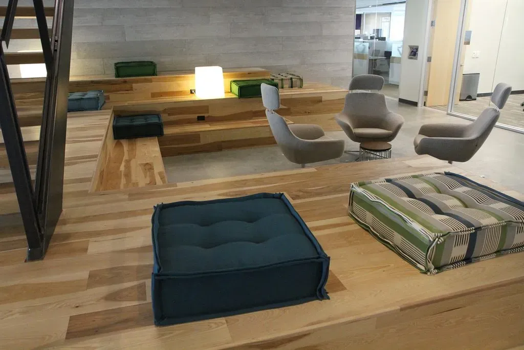 This photo showcases a lobby lounge using pecan wood flooring