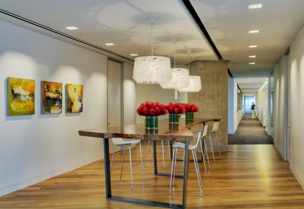 This photo showcases an office using engineered wood floors