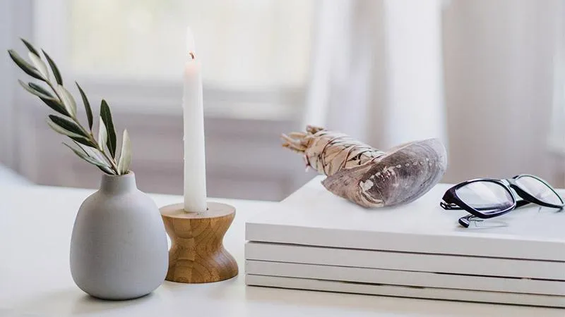 Landscape image of downloadable PDF mockup and video thumbnail on a laptop screen, warm neutral styling for course materials.