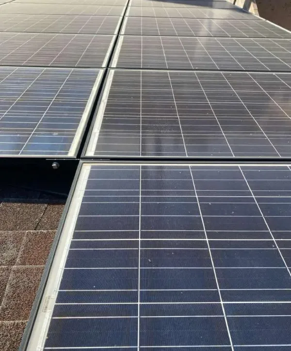 Close-up view of solar panel installation on a residential rooftop