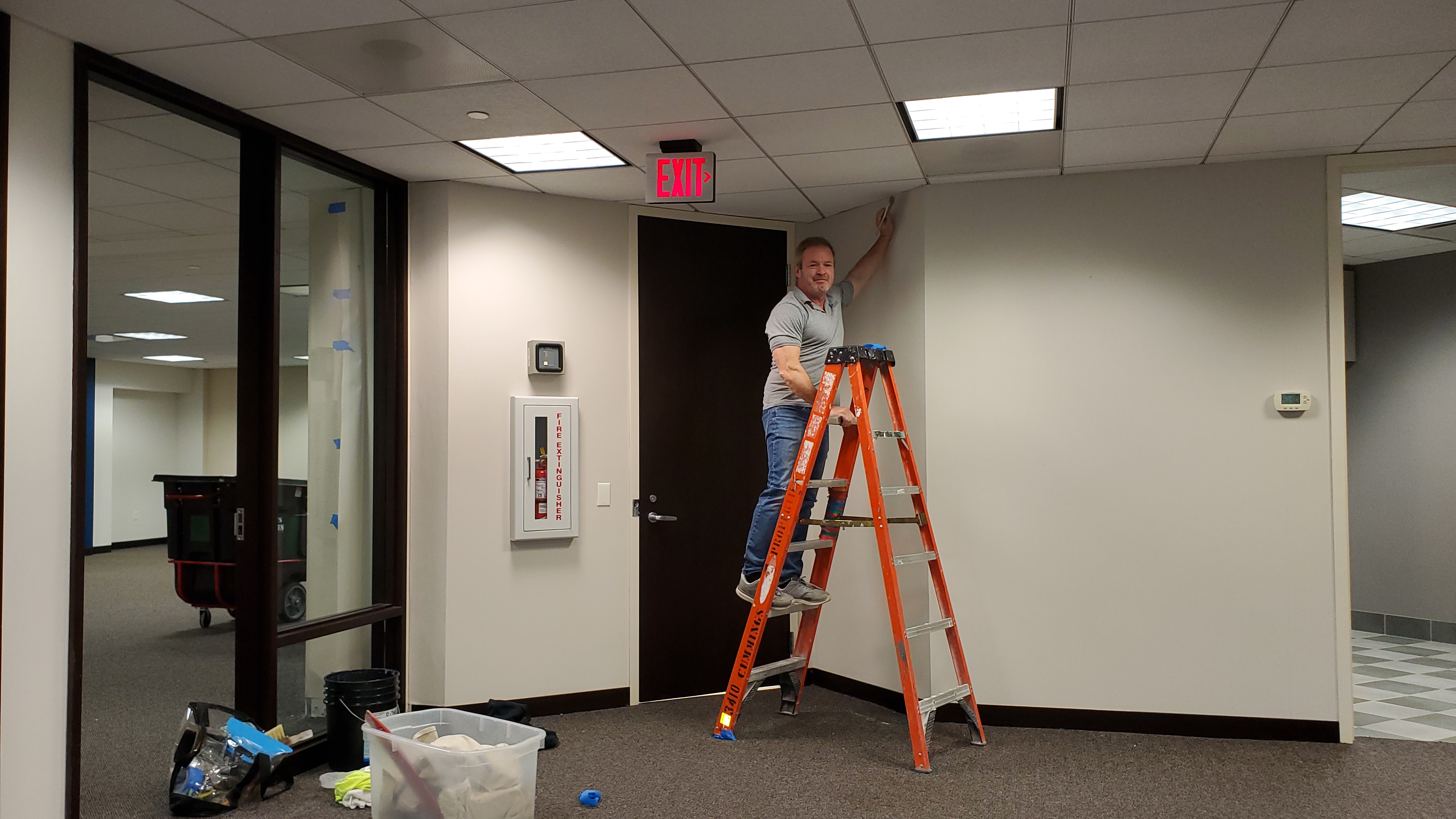 man in black jacket holding spark