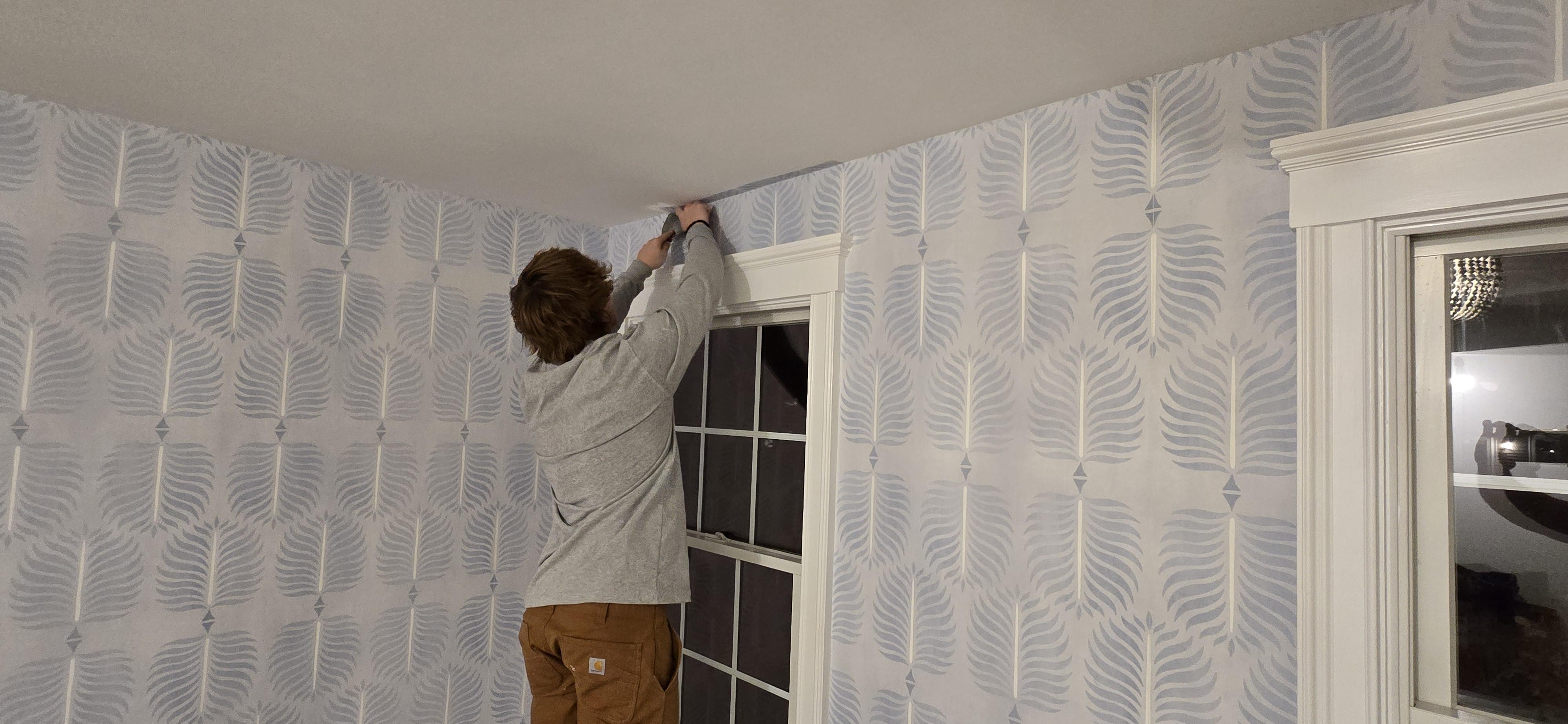 man in black jacket holding spark