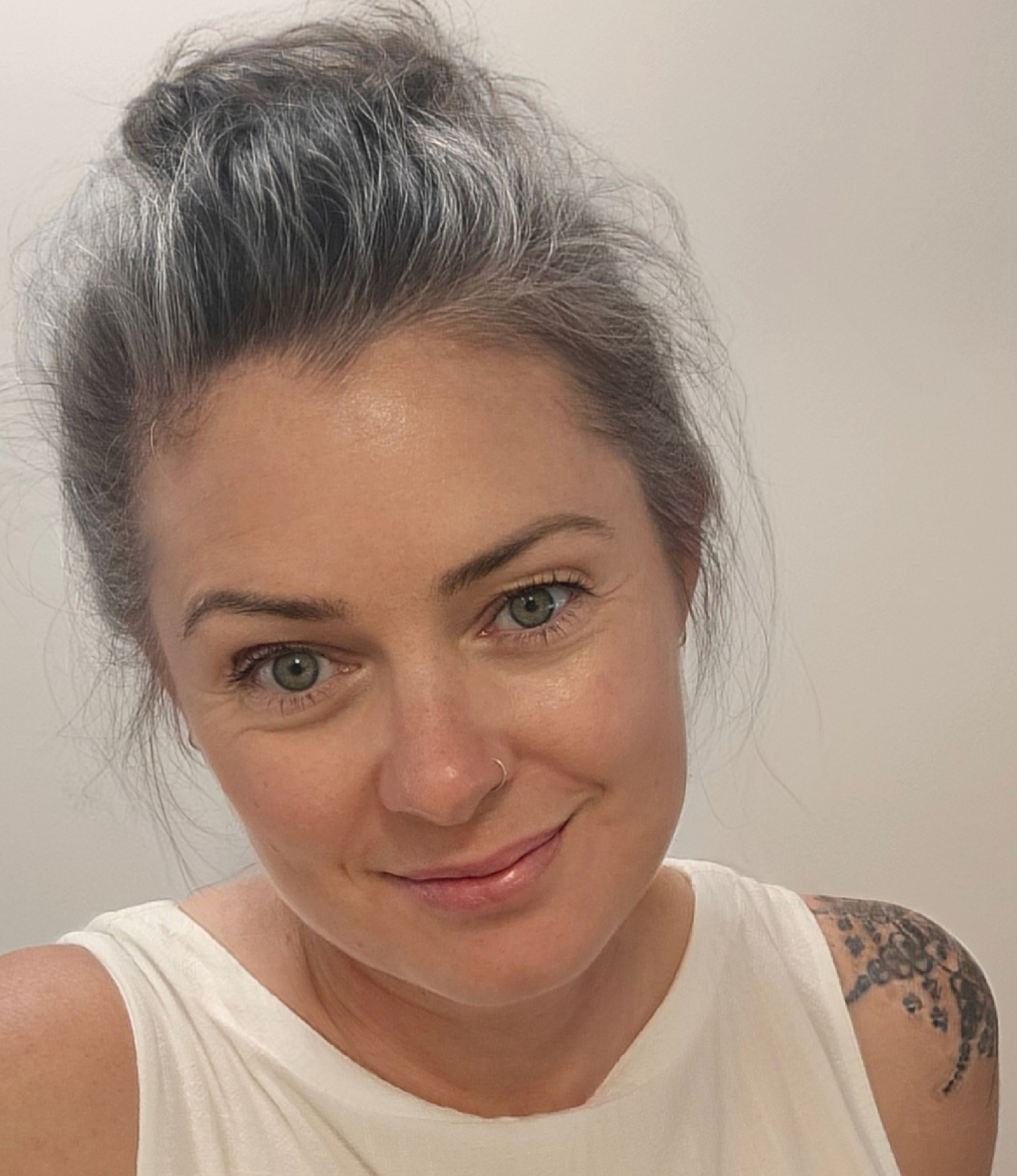 Warm portrait of Carlie Robertson, Mental Health OT and DBT Therapist