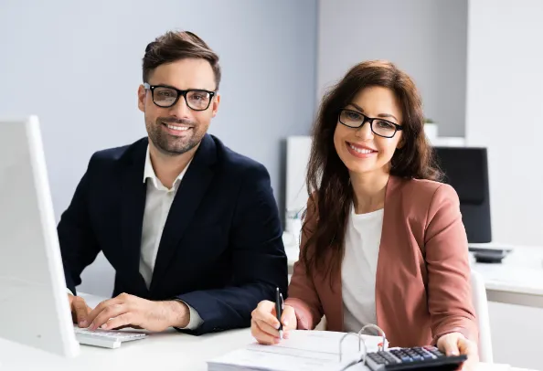 Two nice smiling generic white collar employees