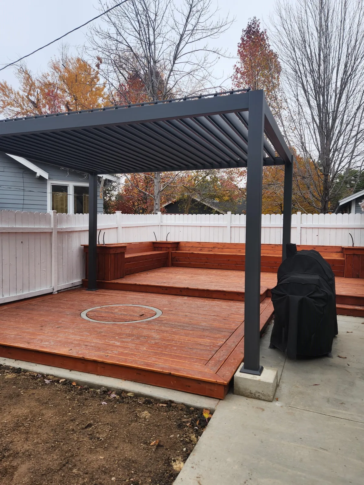 Retractable patio cover installed over a Boise backyard deck for adjustable shade and outdoor living comfort.