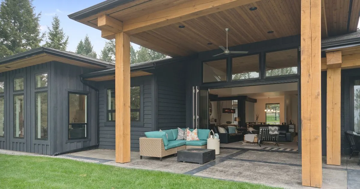 Covered patio and custom deck creating a shaded outdoor living space at a Boise home.