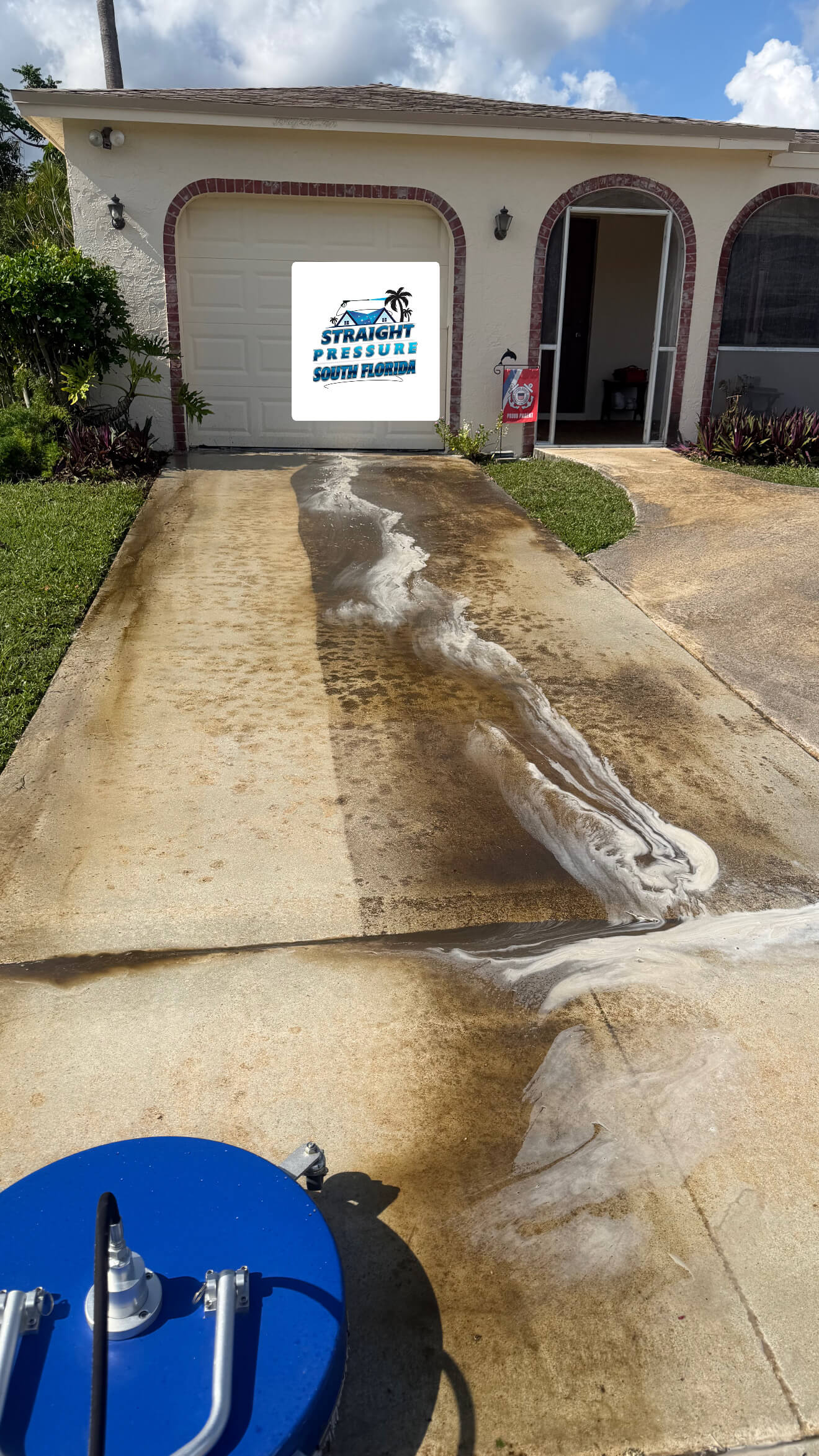 Striking before and after visual of a driveway cleaning project in Boca Raton, FL. The image highlights the stark contrast between the heavily soiled, dark concrete and the bright, clean surface achieved with professional pressure washing services.