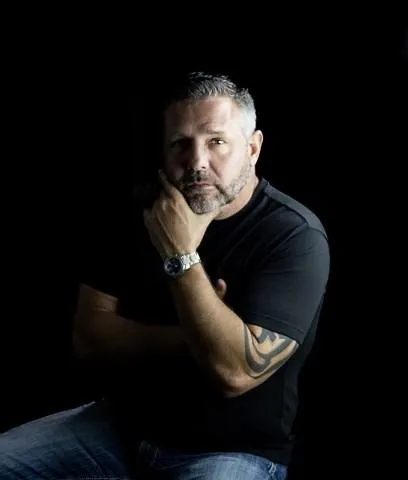 Dr. Joseph Drolshagen portrait representing transformational life coaching and leadership empowerment.