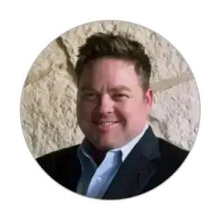 Client testimonial photo representing satisfied business coaching client.