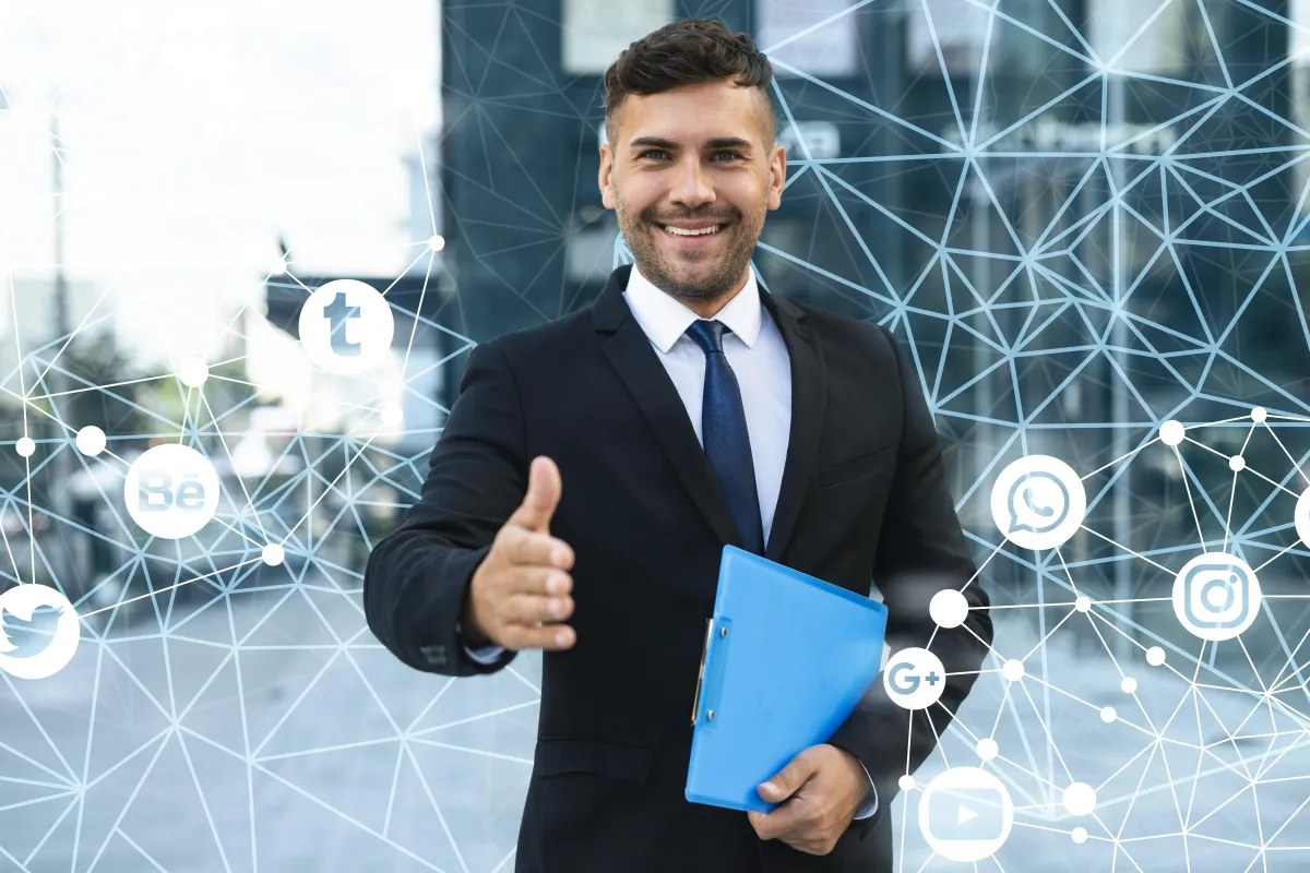 Business professional extending a handshake while holding a portfolio, representing strategic network access, trusted connections, and business influence.