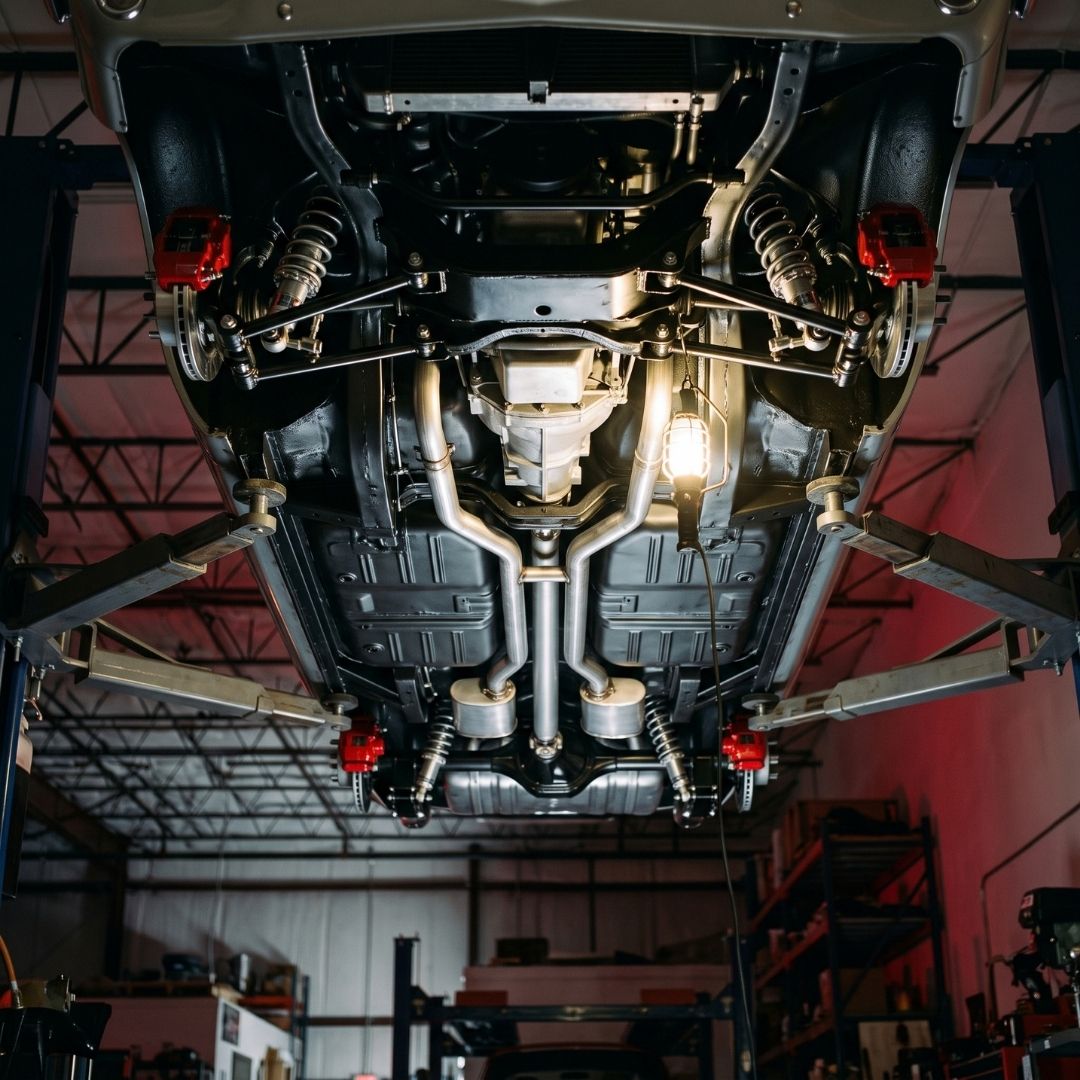 Restored undercarriage with coilovers and disc brakes